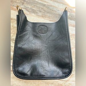 Ah*dorned bag! Great condition. STRAP SOLD SEPARATELY.